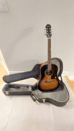 AJ-100 VS Epiphone acoustic guitar and hardshell case. 1