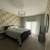 The kitchen features a spacious island, ideal for entertaining guests 10 thumbnail