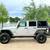 2012 Jeep Wrangler Unlimited Sport clean title 2 thumbnail