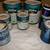 8 asst cans Behr Interior Paint -Cinnamon,Off White-Some never used! 1 thumbnail