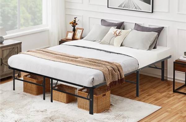 Folding Queen bed frame. (14” clearance for storage underneath) 1