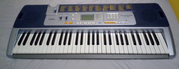 Yamaha and Casio 61 key electric piano keyboards 1