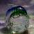 Blue/Green Glass Dolphin With Globe and Encased Bubbles Paperweight 1 thumbnail
