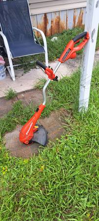 Weed eater and edger by grass hog 1
