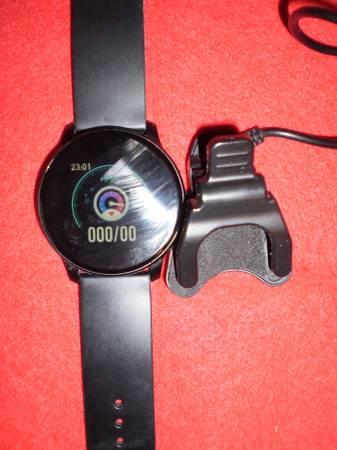 Sport Watch and Charger, 11 functions 1