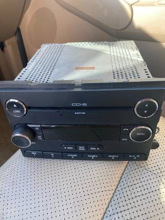 AM/FM/6CD PLAYER WITH MP3 RADIO CAME OUT OF A 2009 FORD EDGE 1