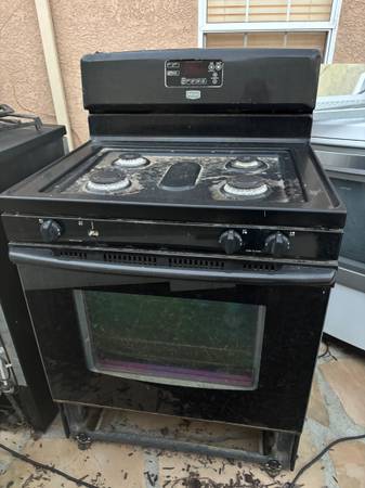 Maytag black 4-burner gas stove and oven 1