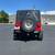 Adventure-Ready 1997 Jeep Wrangler Sport in Vibrant Red 4 thumbnail
