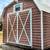 Morgan "red barn" metal storage building 14x24 -- electric, lights, shelf, attic 1 thumbnail