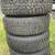 4 wheel set 15” toyota studded winter tires on steel rims with covers 2 thumbnail