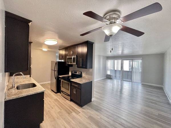 1 Your 3BR 2BA apt | Bright large window in living room | Modern kitchen 1