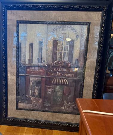 Large ornate black antiques store picture framed of antique shops 1