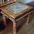 Decorative sm table, sm tapestry under glass (top), metal bracings 2 thumbnail