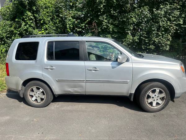 2009 Honda pilot Touring with damage/needs to be towed - $1,50063623687289857123