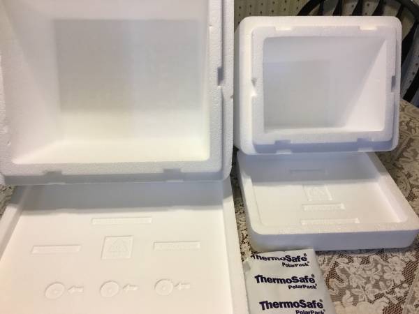 Two Styrofoam containers plus 7 bags of Polar Ice 1