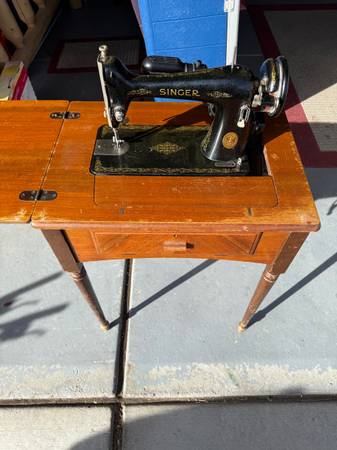 Singer sewing machine. & table 1