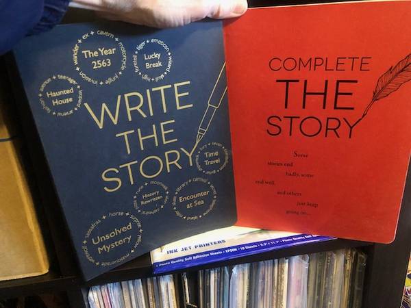 Write the Story + Compete the Story (writing journals, NEW) both $10 1
