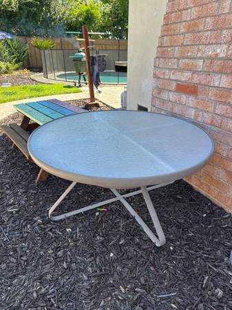 Glass top outdoor table 54in 1