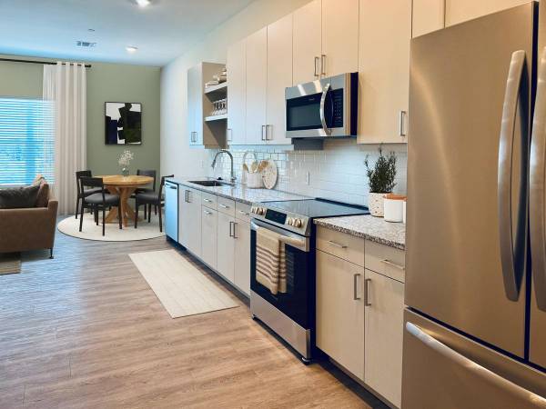 Impeccable location. New Apartments -Granite Kitchens, Washer/Dryer 1