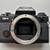 Olympus OM-4 Black 35mm film camera with 50mm lens 3 thumbnail