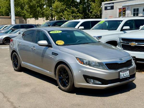 1 2012 Kia Optima LX 4dr Sedan 6A - Comes with Warranty! 1