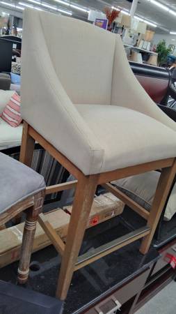 One beige counter height chair 1