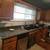 Oak kitchen cabinets + granite countertops + sink 3 thumbnail