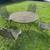 VINTAGE - SOLID WROUGHT IRON PATIO SET WITH TABLE AND 4 ROCKER CHAIRS. 6 thumbnail