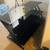 Sleek black glass TV Stand (almost new) 1 thumbnail