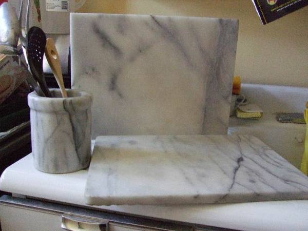 2 white Marble cutting boards and utensil holder!  Very nice! 1