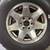 One 6 lug Cadillac Escalade 17 inch rim and old tire. fit Chevy GMC 1 thumbnail