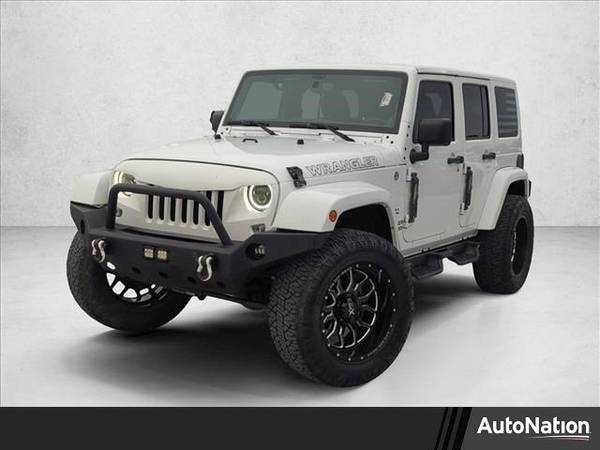 2014 Jeep Wrangler Unlimited Sahara 4x4 4WD SUV AUTONATION 1