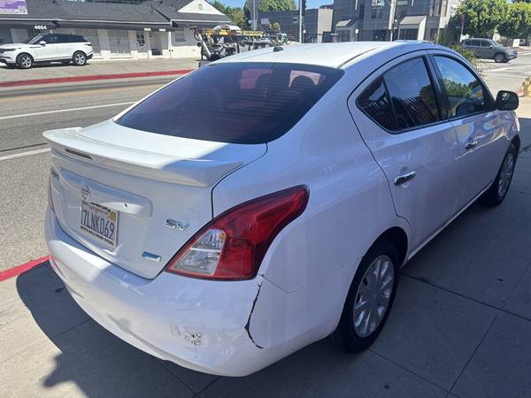 2014 Nissan Versa 1.6 SV - $4,98863441143860865123
