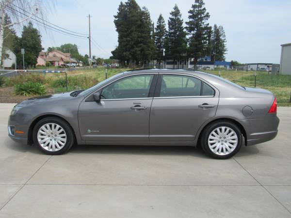 2012 FORD FUSION HYBRID - $7,995 (REPEAT AUTO SALES)63619519640833123