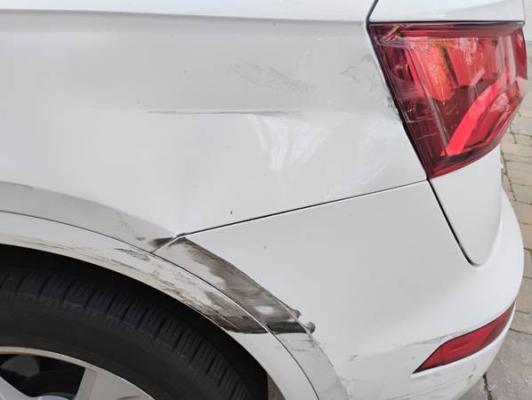 Auto body and dent help with white Audi and dent help 1
