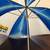 Large blue and white Hertz Car Sales umbrella and small animal face umbrella. 2 thumbnail