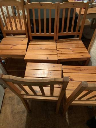 6 solid pine chairs $45 each, solid pine table $150; delivery 1