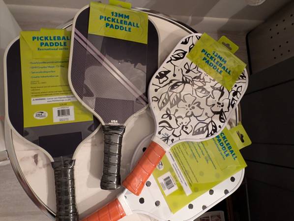 four pickleball paddles 1