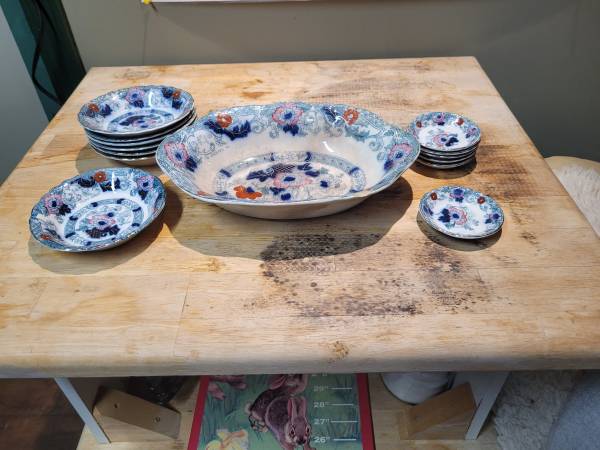 Antique scalloped oval serving platter with side dishes 1
