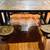 world market-5 ft length x 3.5 ft-4 person teak/iron dining table w/ floating se 5 thumbnail