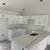 Cabinets and white  countertops 13 thumbnail