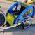 Children's bike trailer holds 2 good condition 1 thumbnail