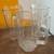 35 plastic restaurant pitchers and 10 wine glasses 1 thumbnail