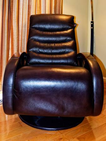 Like New - Black Leather 360° Swivel Rocker Recliner - Zero-Gravity 1