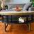 Solid Tiger Quart Top Two Tier Oval Coffee Table With Brass Accents 2 thumbnail