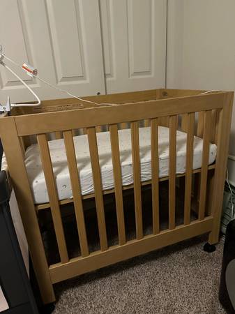 Mini crib - it folds!! Easy move! Babyletto Origami Mini Crib with Wheels - GREE 1