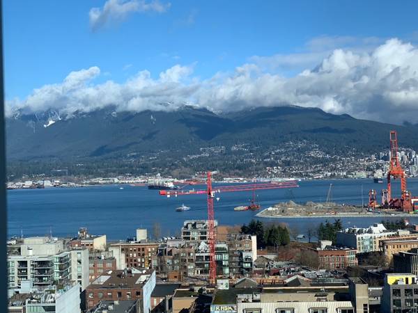 Luxury Sub-Penthouse with Panoramic Water, Mountain & City Views 1