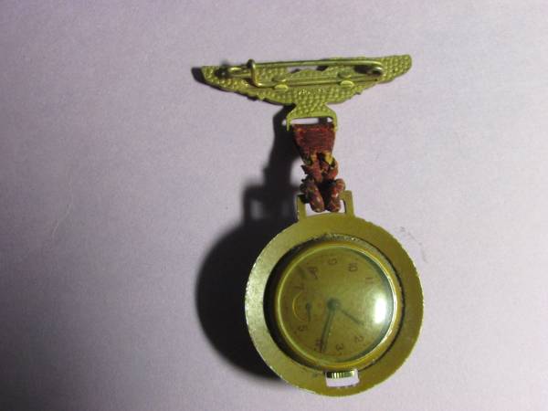 WW II Watch/ pin 1