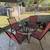 Round steel patio table with 4 mesh chairs set 1 thumbnail