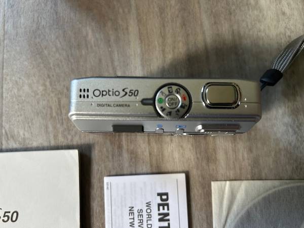 PENTAX OPTIO S50 5MP DIGITAL CAMERA WITH MANUALS AND CASE